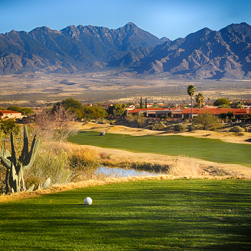 view of golf course with mountains